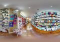 Interior view of a pharmacy showcasing various health products on shelves
